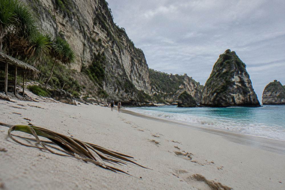 White sand beach and steep cliffs at Diamond Beach on Nusa Penida's east coast