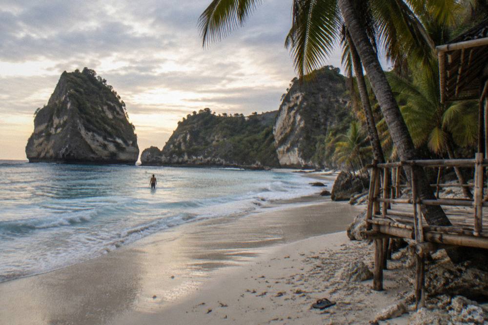 A quiet beach cove on Nusa Penida in late afternoon light